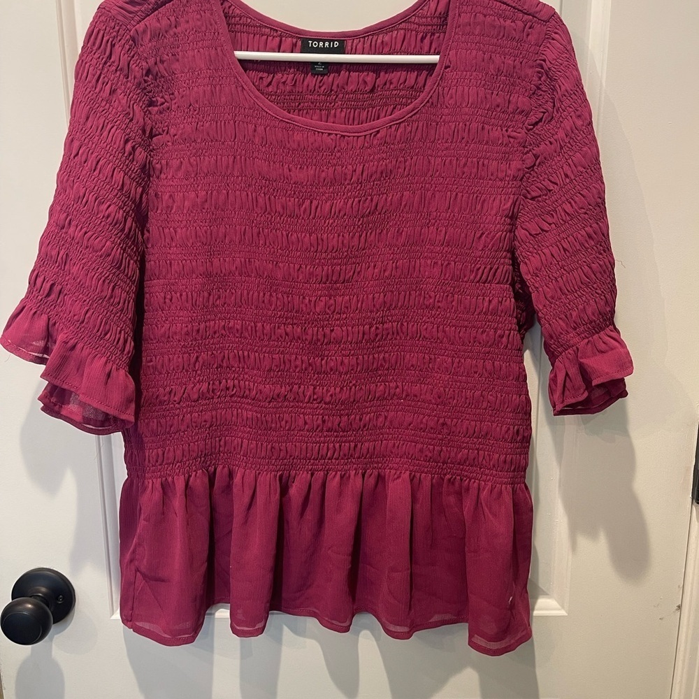 Torrid Women's Pink Smocked Top size 2.
0028